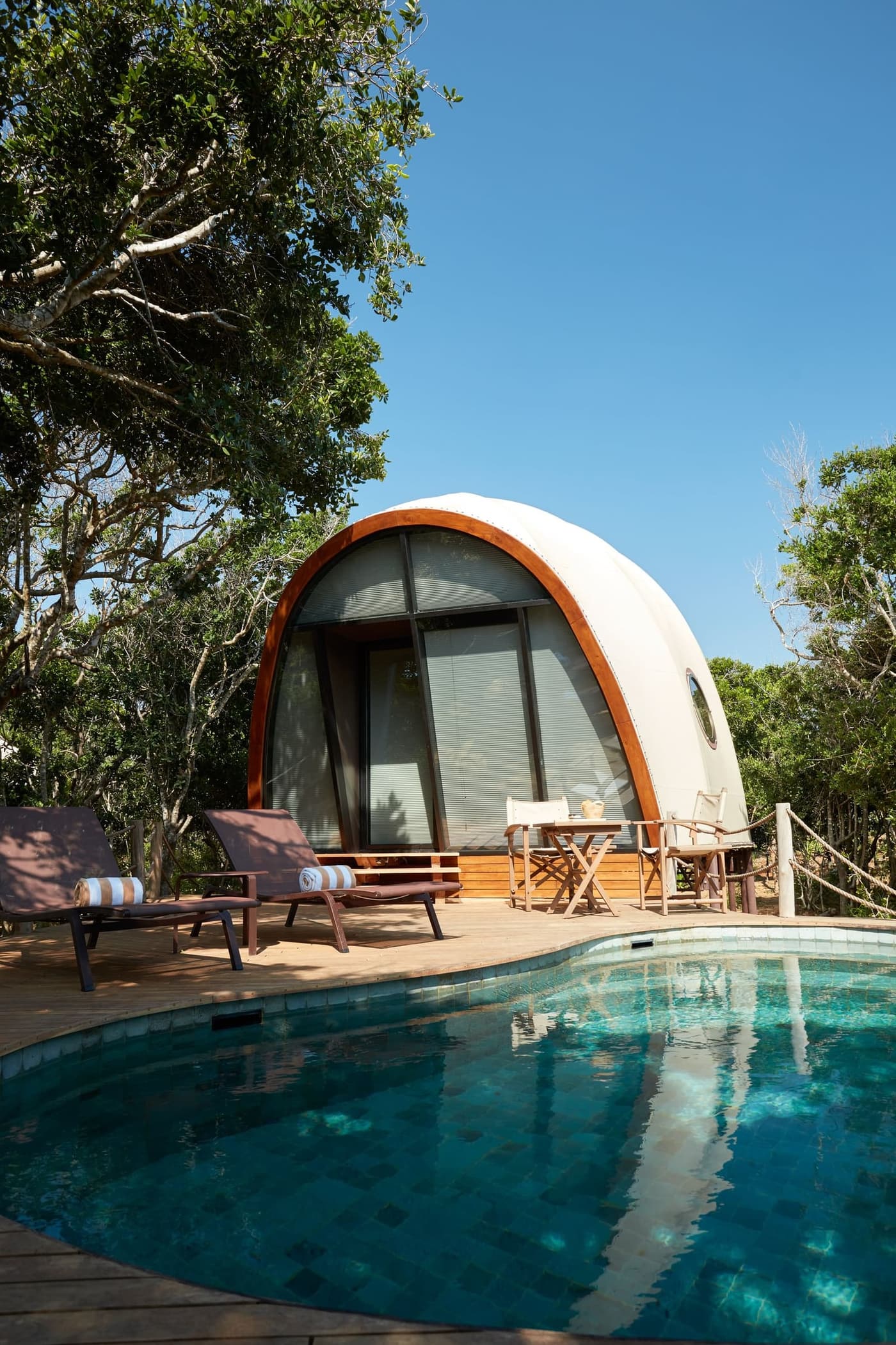 A cocoon-shaped tent among the trees at Yala